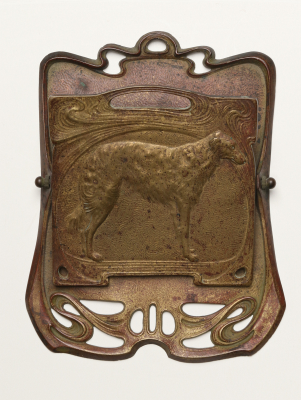 AN ART NOUVEAU INFLUENCE BILL CLIP WITH DOG C 1900