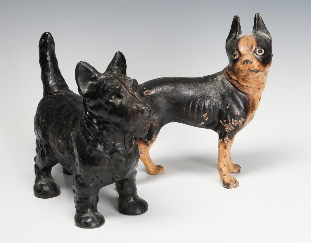 TWO GOOD ANTIQUE DOG DOORSTOPS