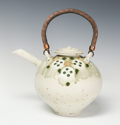 A TOM TURNER STUDIO PORCELAIN TEA POT WITH COPPER