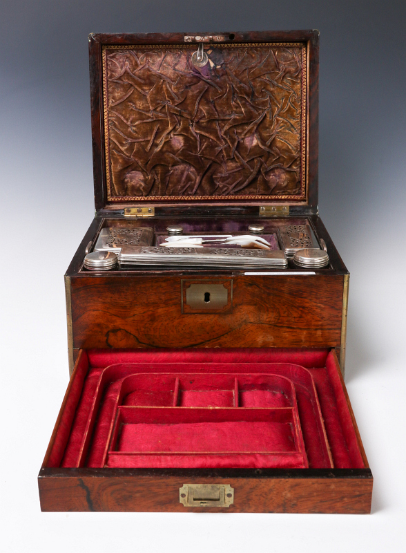 A VICTORIAN VANITY SET IN BRASS BOUND ROSEWOOD BOX