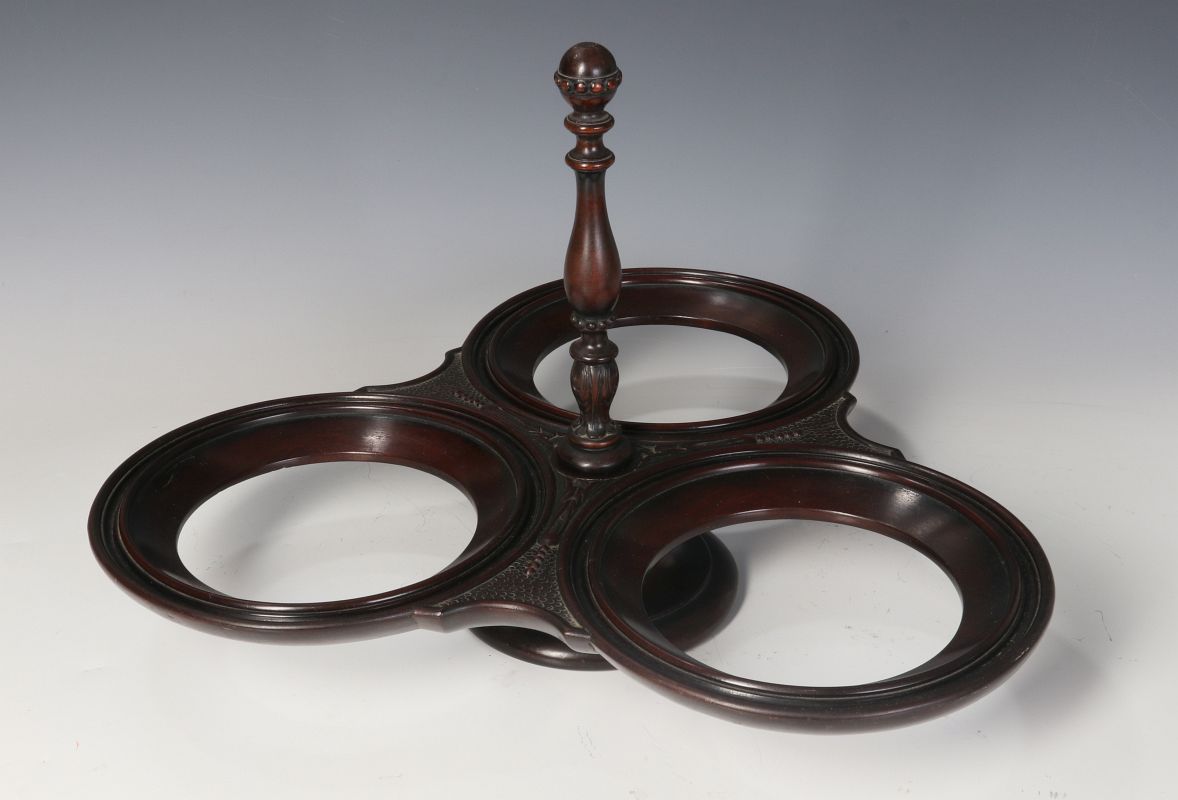 A SCOTTISH MAHOGANY REVOLVING PLATE STAND C. 1900