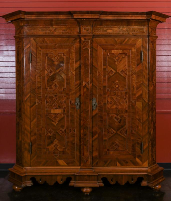 AN INTRICATELY INLAID 19TH CENTURY GERMAN SCHRANK