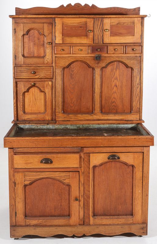 AN UNUSUAL MULTI-DRAWER KITCHEN CABINET