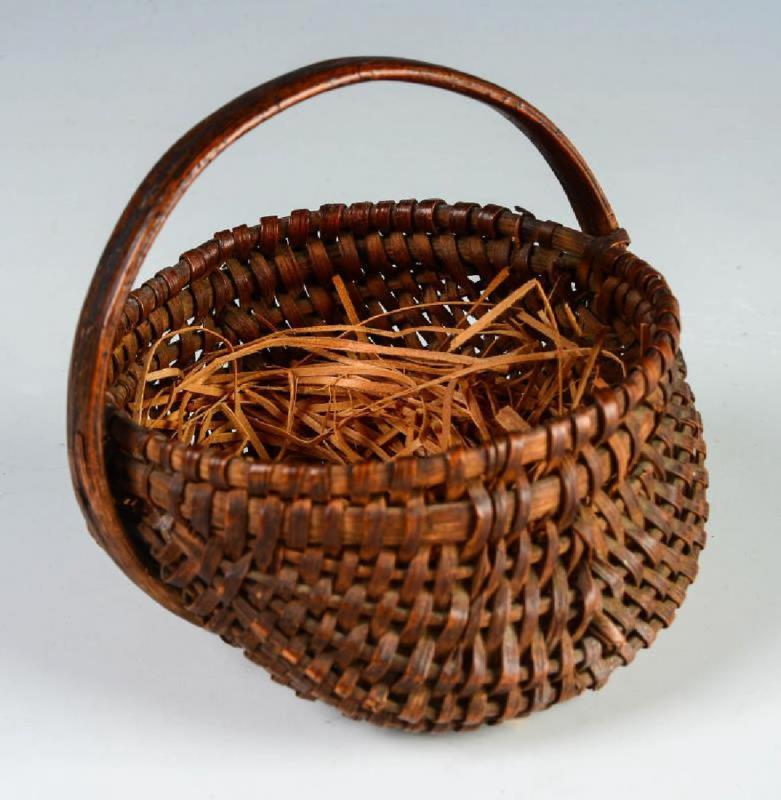 A 19TH CENTURY MINIATURE BUTTOCKS BASKET