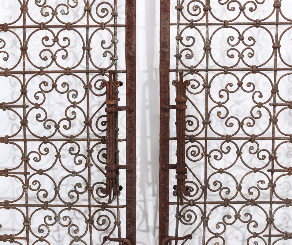 AN EXCEPTIONAL HAND FORGED ORNAMENTAL IRON ENTRY