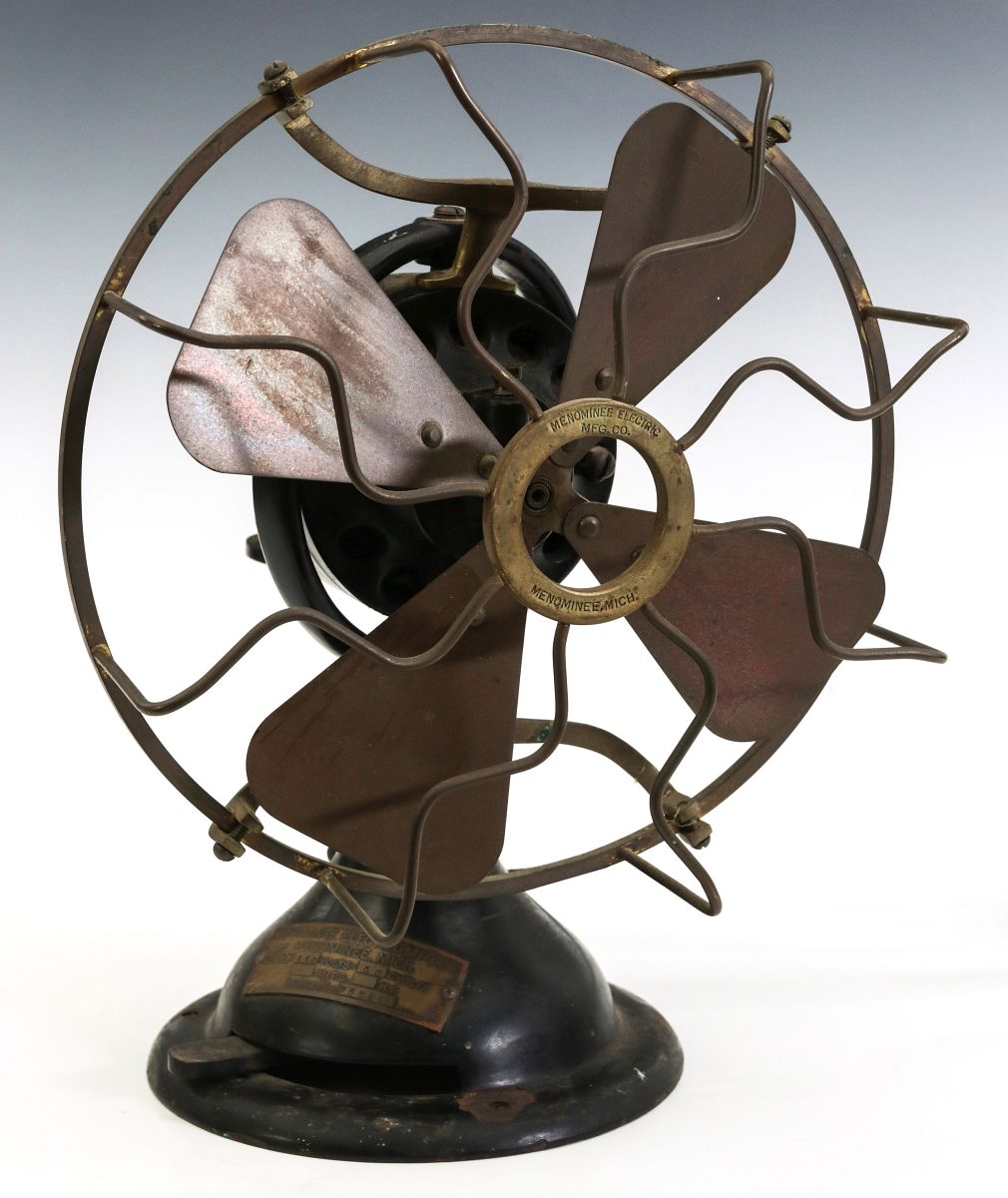 A MENOMINEE 9-INCH OSCILLATING FAN CIRCA 1917