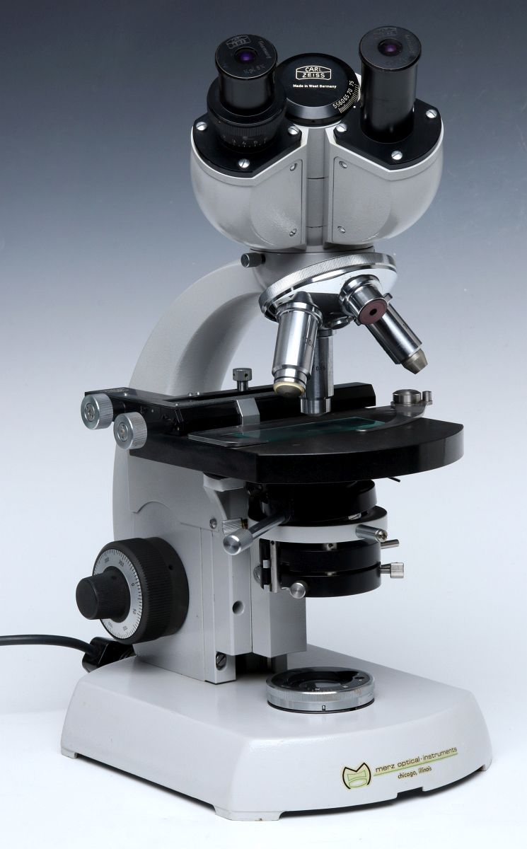 A VINTAGE CARL ZEISS BINOCULAR MICROSCOPE