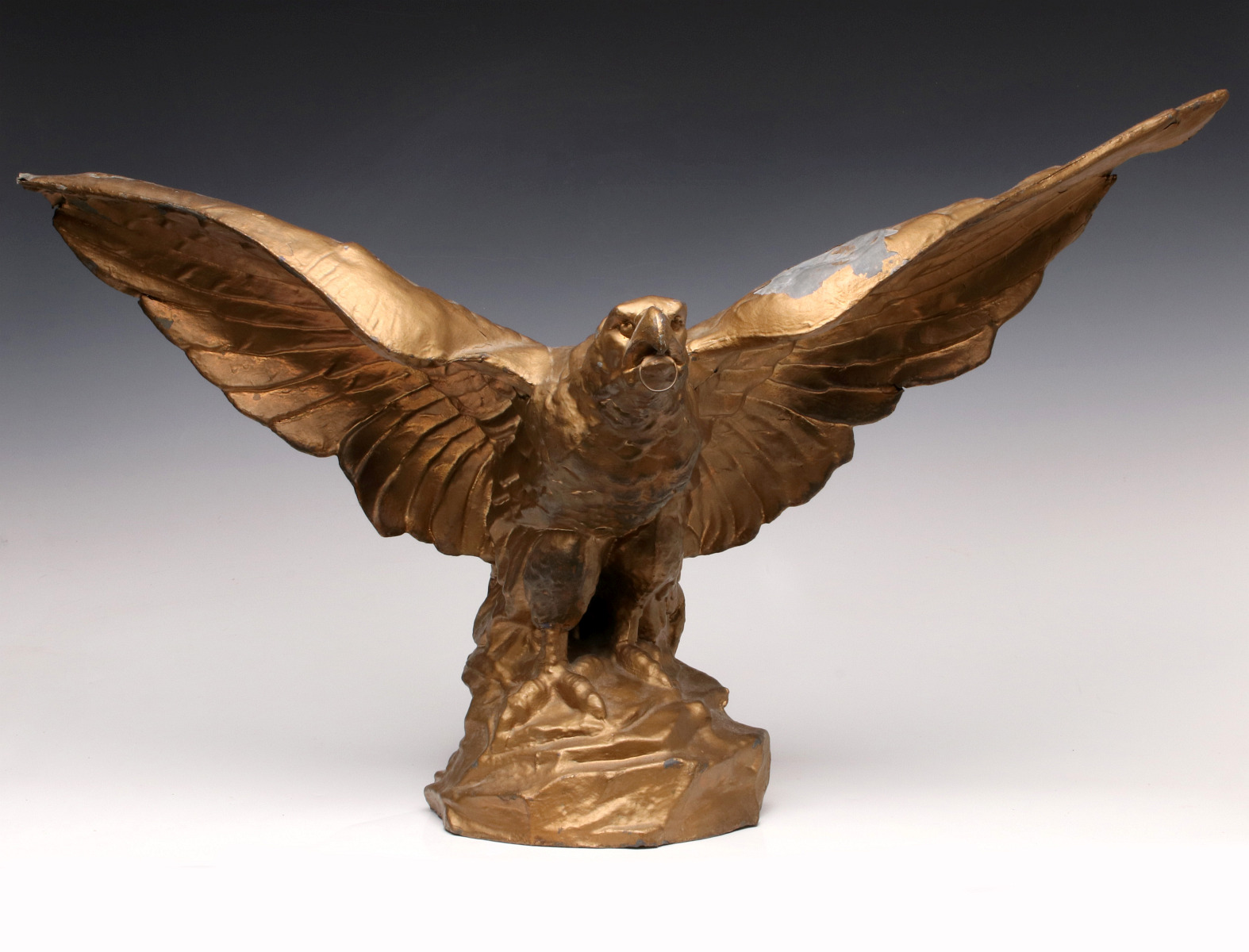 A 19TH CENTURY MOLDED ZINC FIGURE OF AN AMERICAN EAGLE