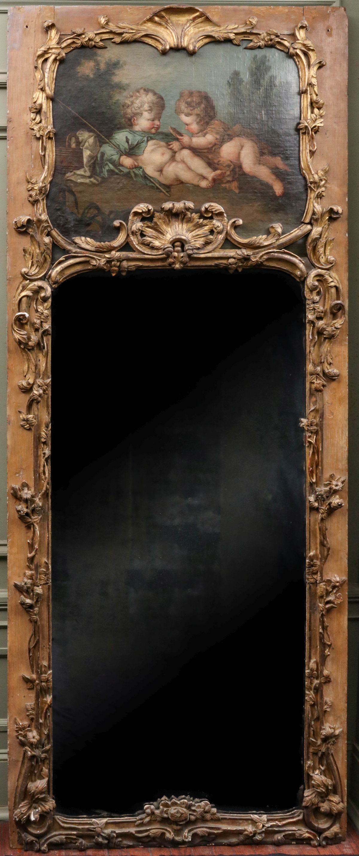 A GOOD 18TH CENTURY FRENCH ROCOCO TRUMEAU MIRROR