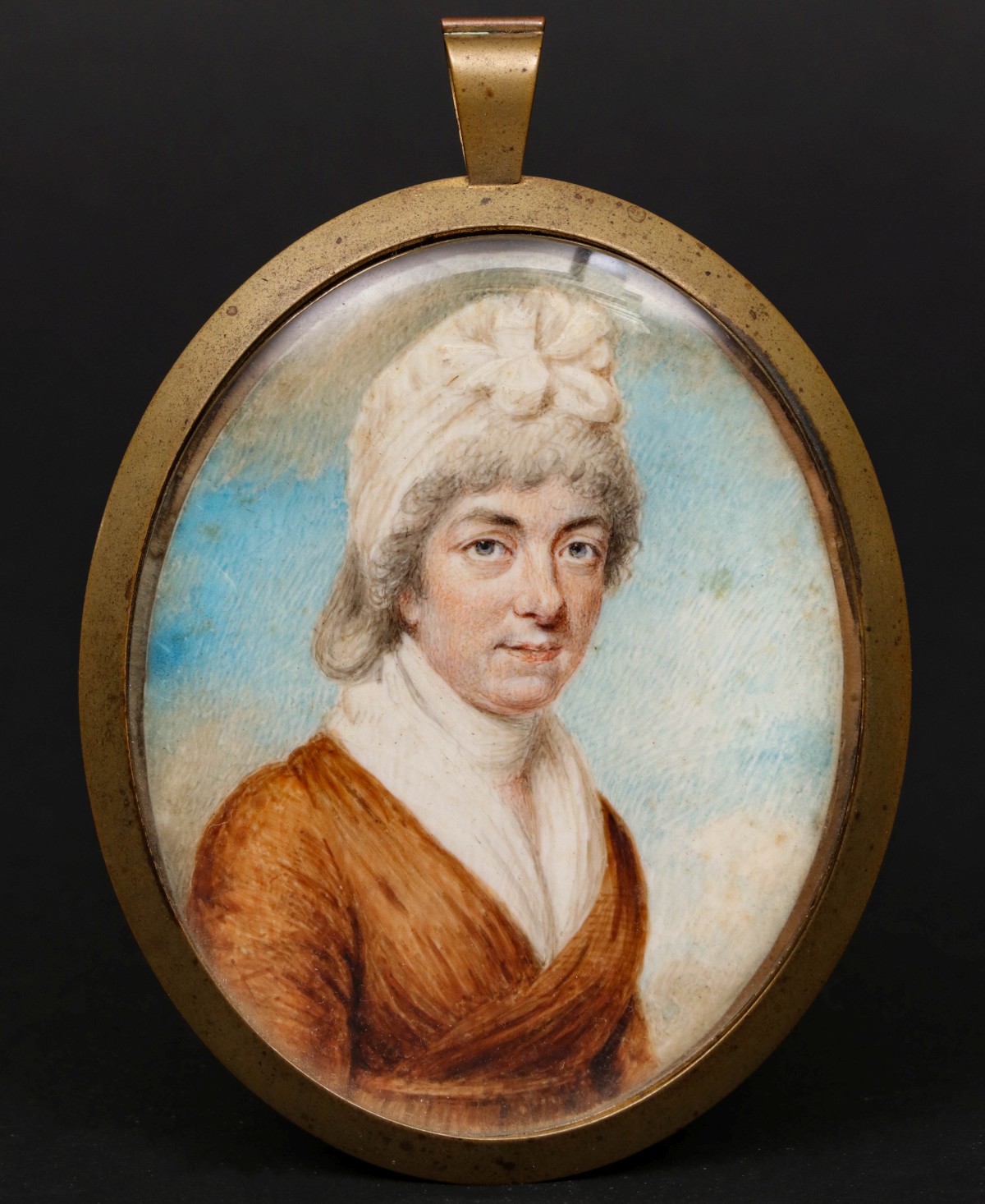 AN EARLY 19TH C. ENGLISH SCHOOL MINIATURE PORTRAIT