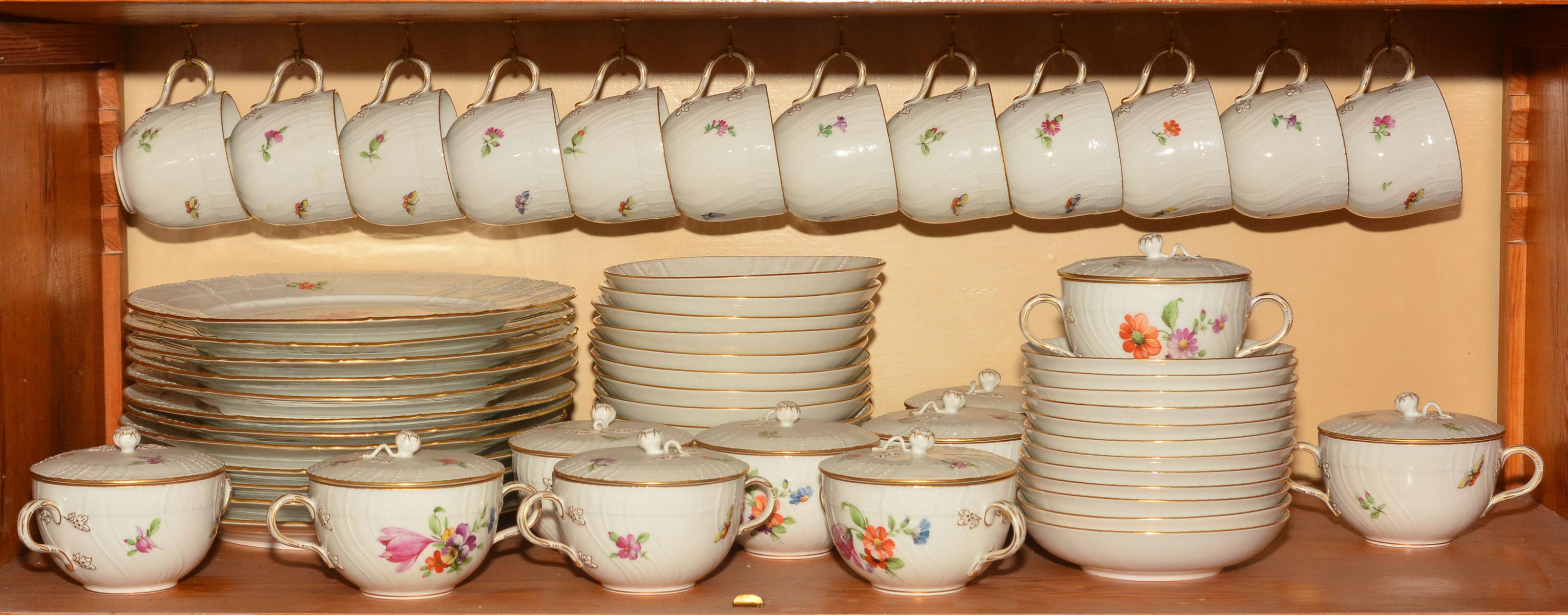 A KPM PORCELAIN PARTIAL DINNER SERVICE