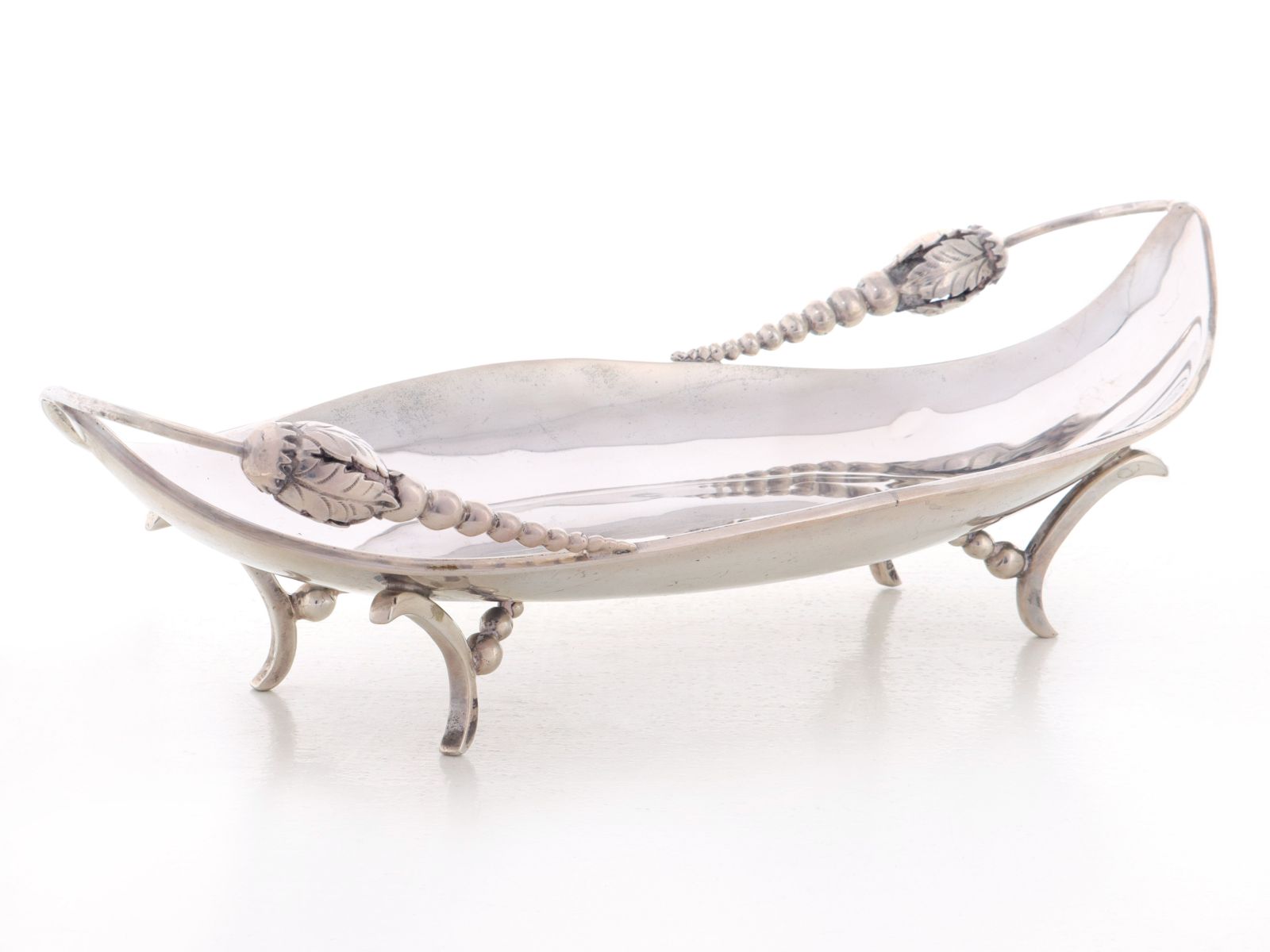 A MID 20TH C. MEXICAN STERLING SILVER FOOTED TRAY