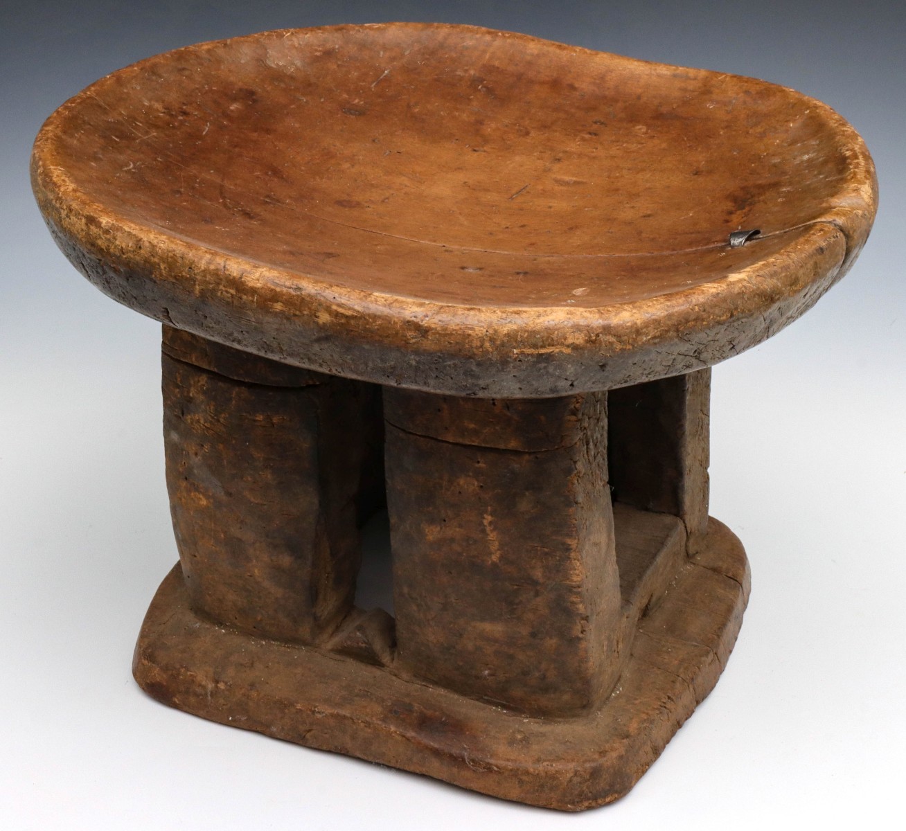 A WEST AFRICAN WOOD STOOL