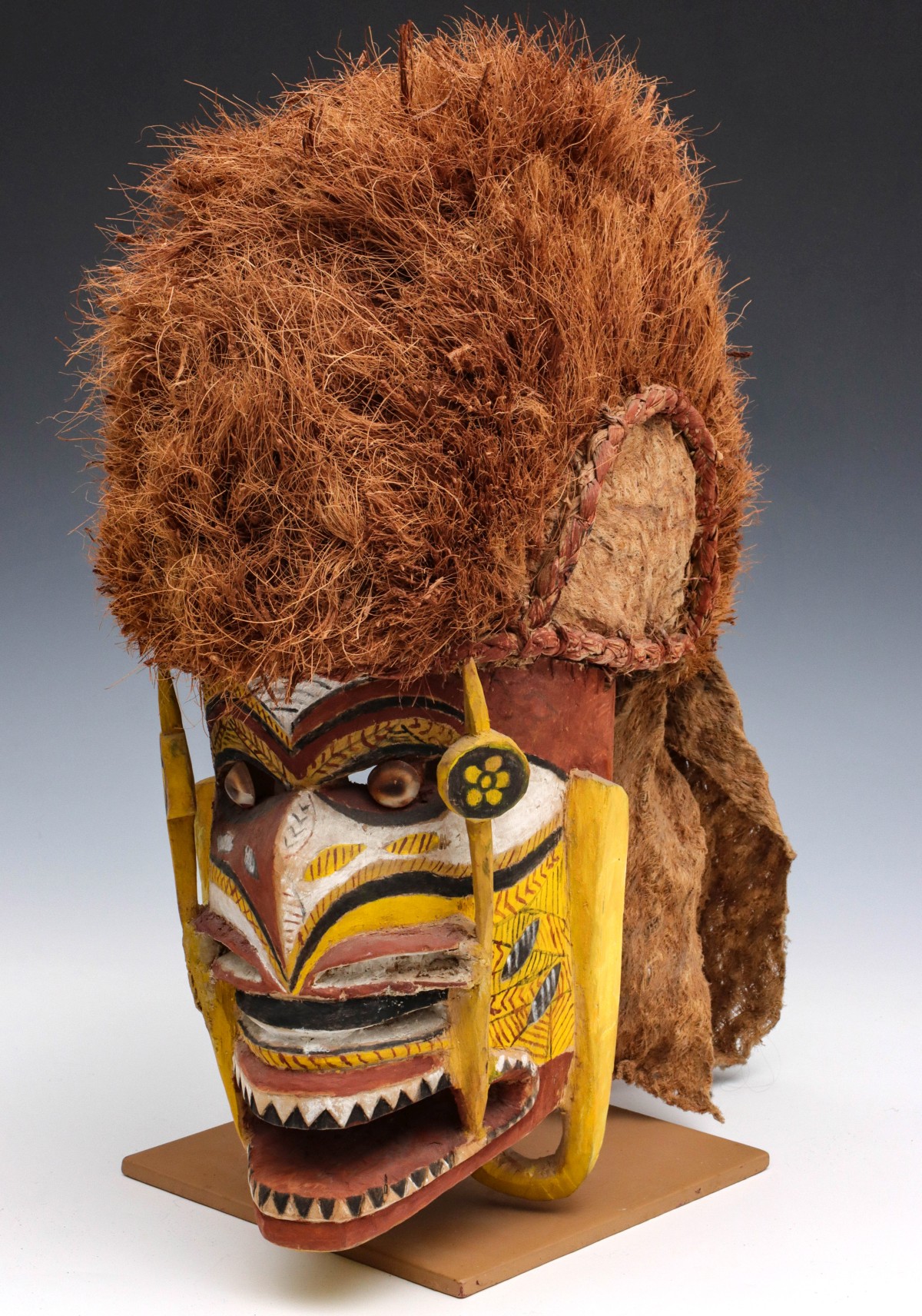 A 20TH C. NEW IRELAND TATANUA DANCE MASK WITH FIBER