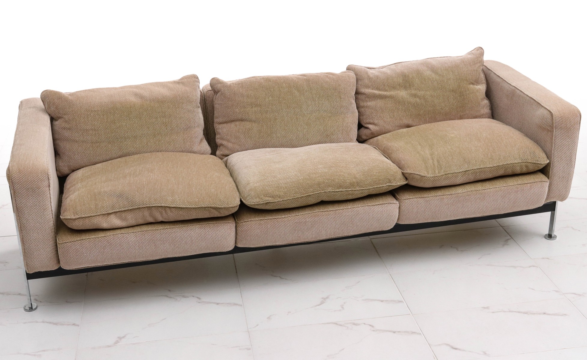 A STENDIG CHROME FRAME SOFA DESIGNED BY HAUSSMANN