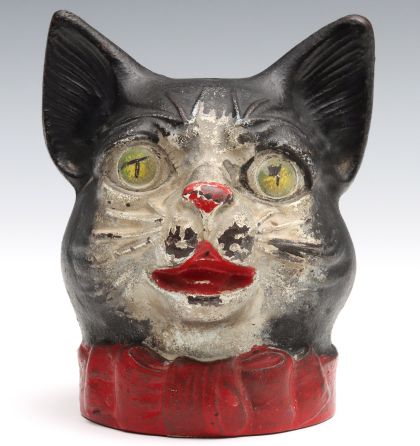 A Rare Cast Iron Cat Head String Holder