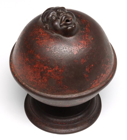 A Rare Cast Iron String Holder