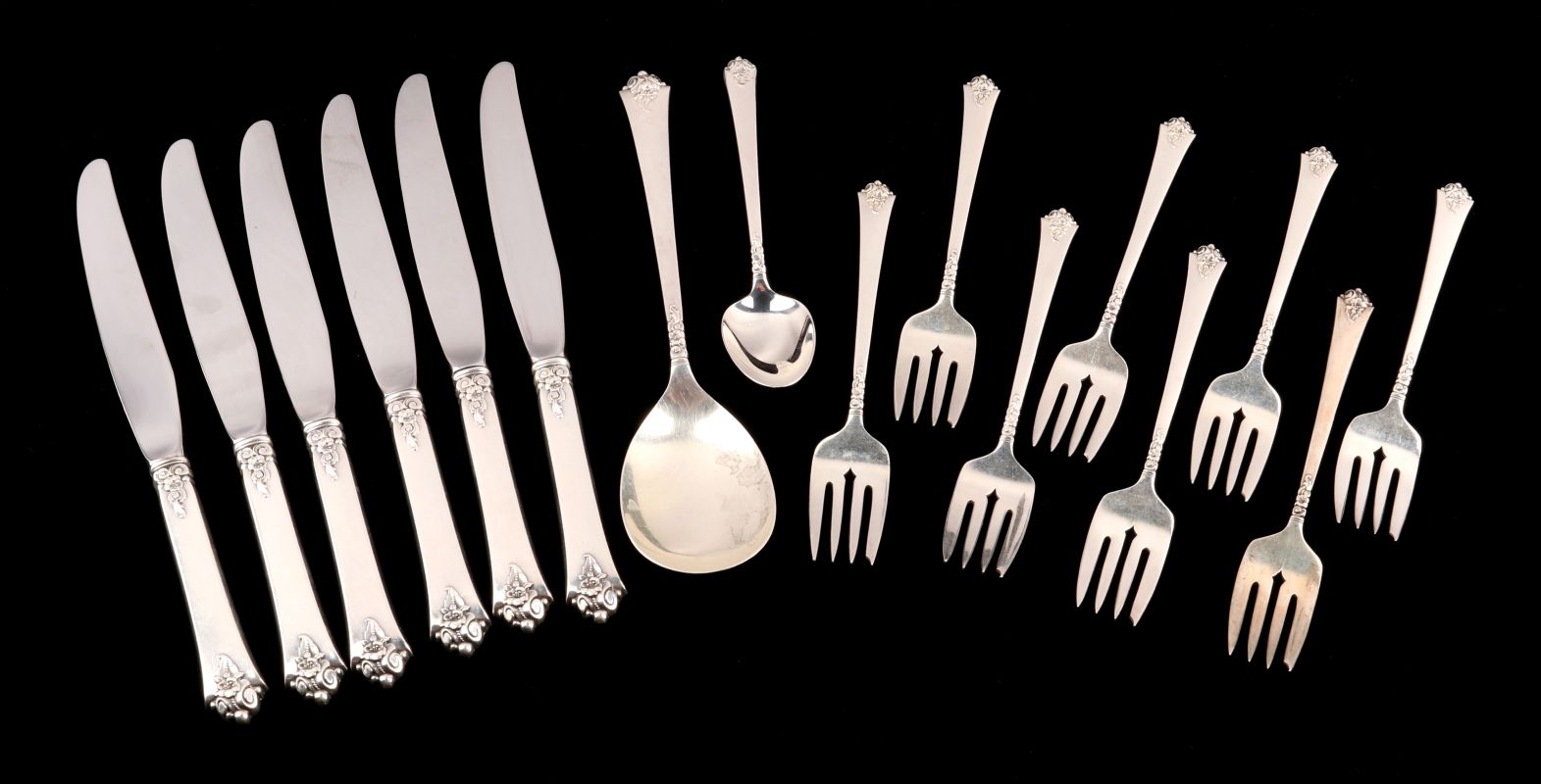 A 'CASTLE ROSE' PATTERN STERLING FLATWARE SERVICE