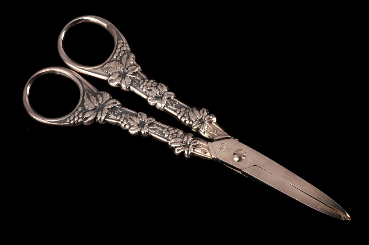 A PAIR EARLY 20TH C. GRAPE SHEARS WITH CAST HANDLES