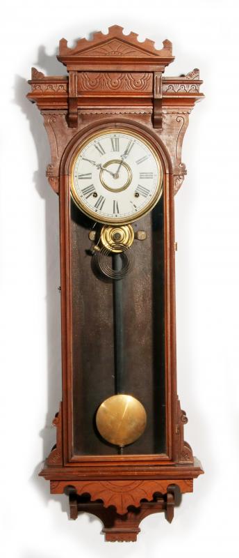 A GOOD 19TH CENTURY E. N. WELCH WALNUT REGULATOR 