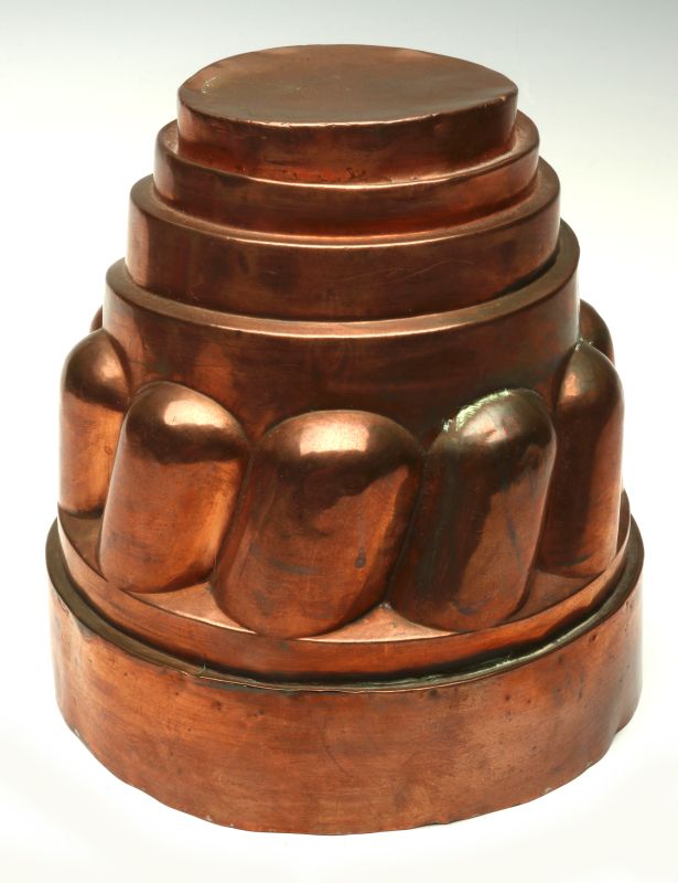 AN ANTIQUE COPPER FOOD MOLD