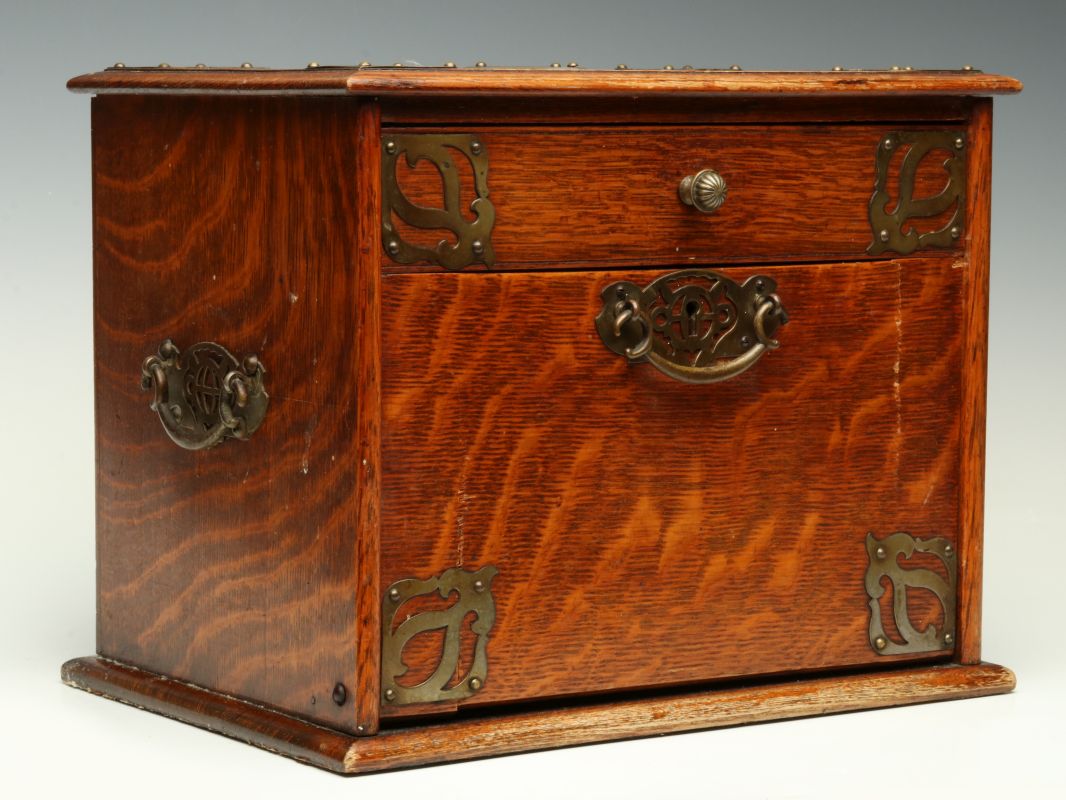 A CIRCA 1890 ENGLISH BRASS BOUND OAK SMOKING BOX