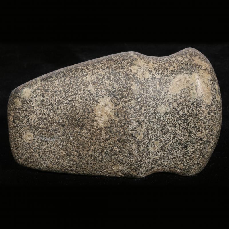 A FULL GROOVE STONE AXE HEAD