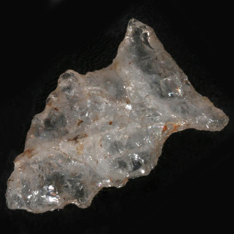 A VERY RARE QUARTZ SIDE NOTCH POINT