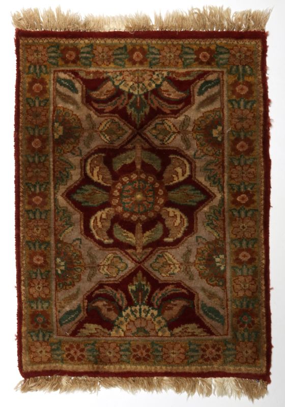 A SMALL 20TH CENTURY TURKISH RUG