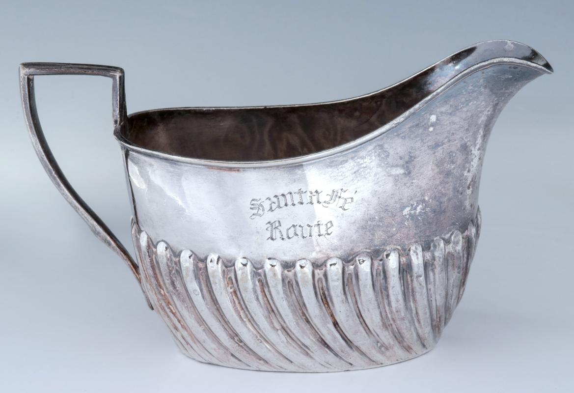 AN EARLY SANTA FE ROUTE SILVER CREAMER