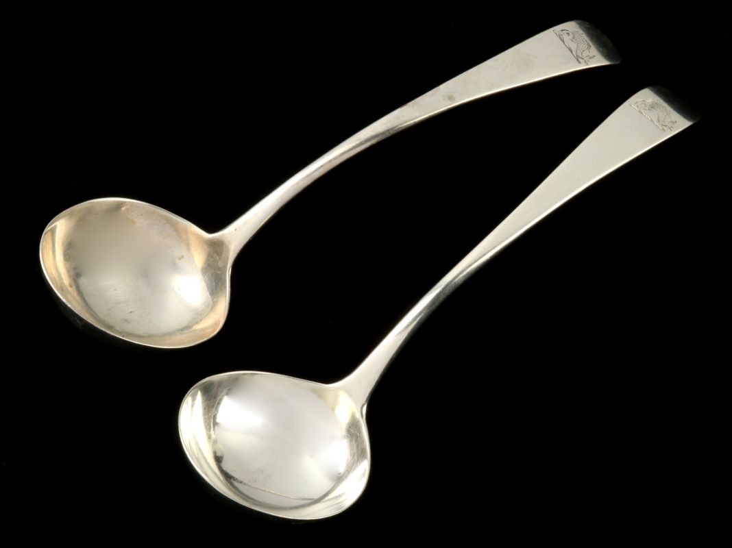 A PAIR OF HESTER BATEMAN STERLING SAUCE LADLES