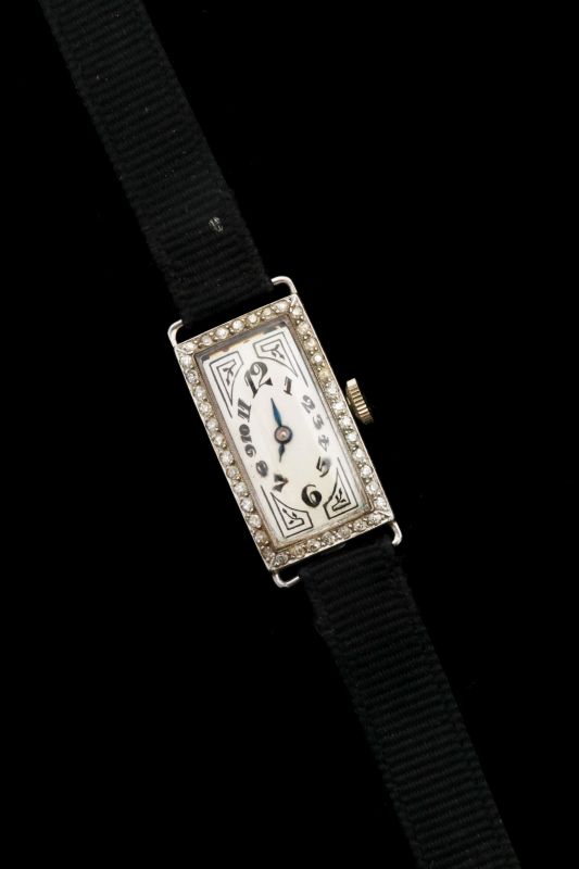 AN ART DECO PLATINUM AND DIAMOND WATCH