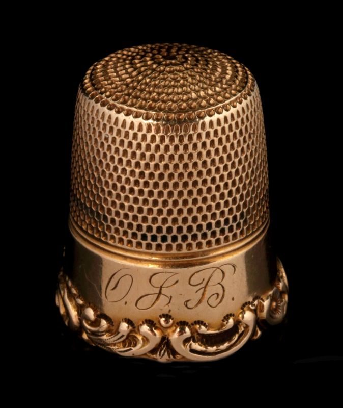 A 14K GOLD THIMBLE