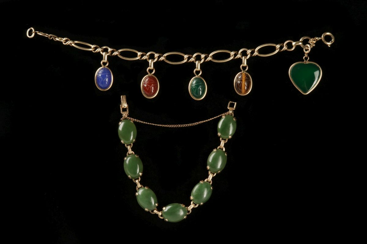 A 14K GOLD JADE BRACELET AND SCARAB CHARM BRACELET