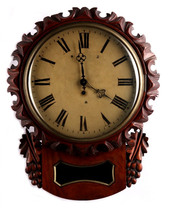 A CARVED MAHOGANY CONTINENTAL WALL CLOCK