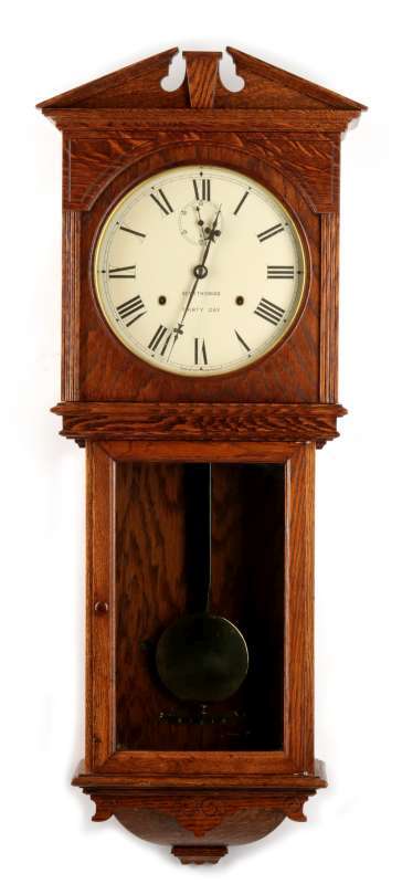 A SETH THOMAS 'UMBRIA' OAK WALL REGULATOR