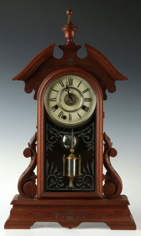 A FANCY WALNUT PARLOR CLOCK