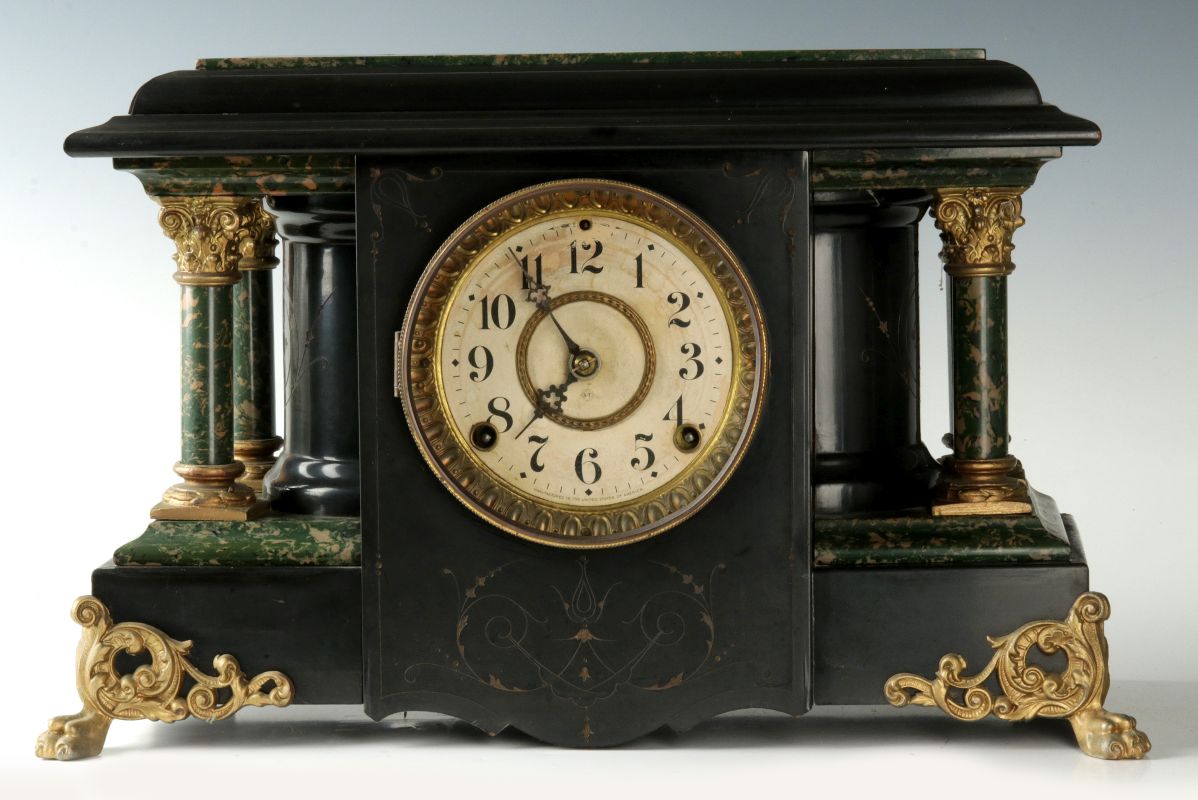 A SETH THOMAS ADAMANTINE COLUMNS MANTEL CLOCK