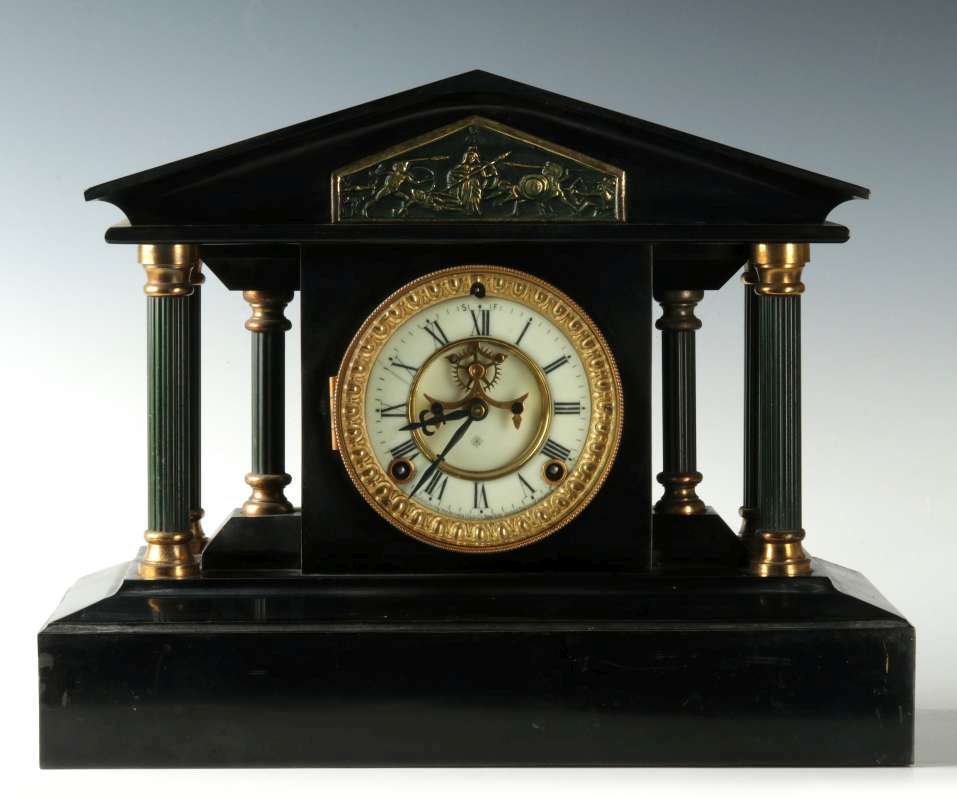 AN ANSONIA 'LOIRE' ENAMELED IRON CASE MANTLE CLOCK