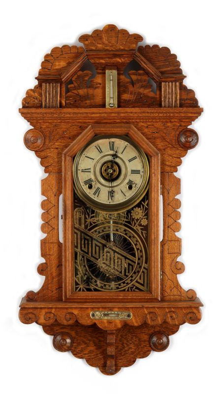 A WATERBURY CROWN HANGING KITCHEN CLOCK