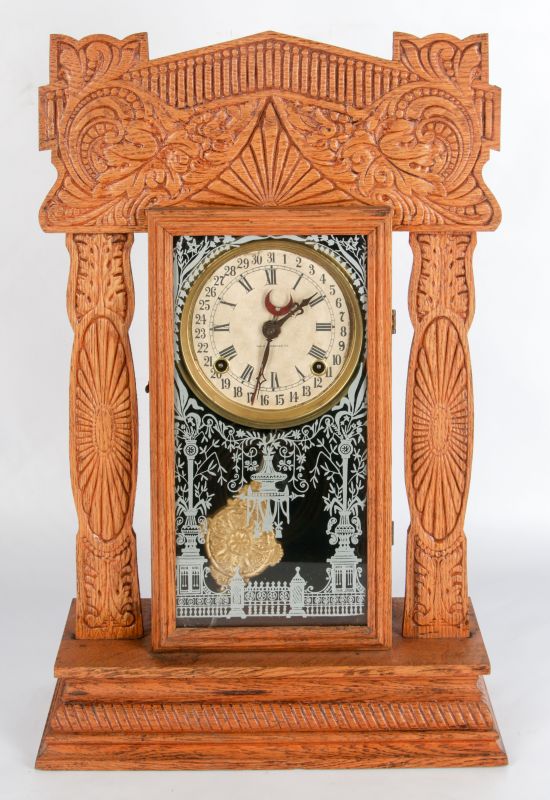 AN INGRAHAM 'PACIFIC' GINGERBREAD CALENDAR CLOCK 