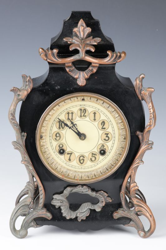 A NEW HAVEN CORYDON IRON MANTEL CLOCK