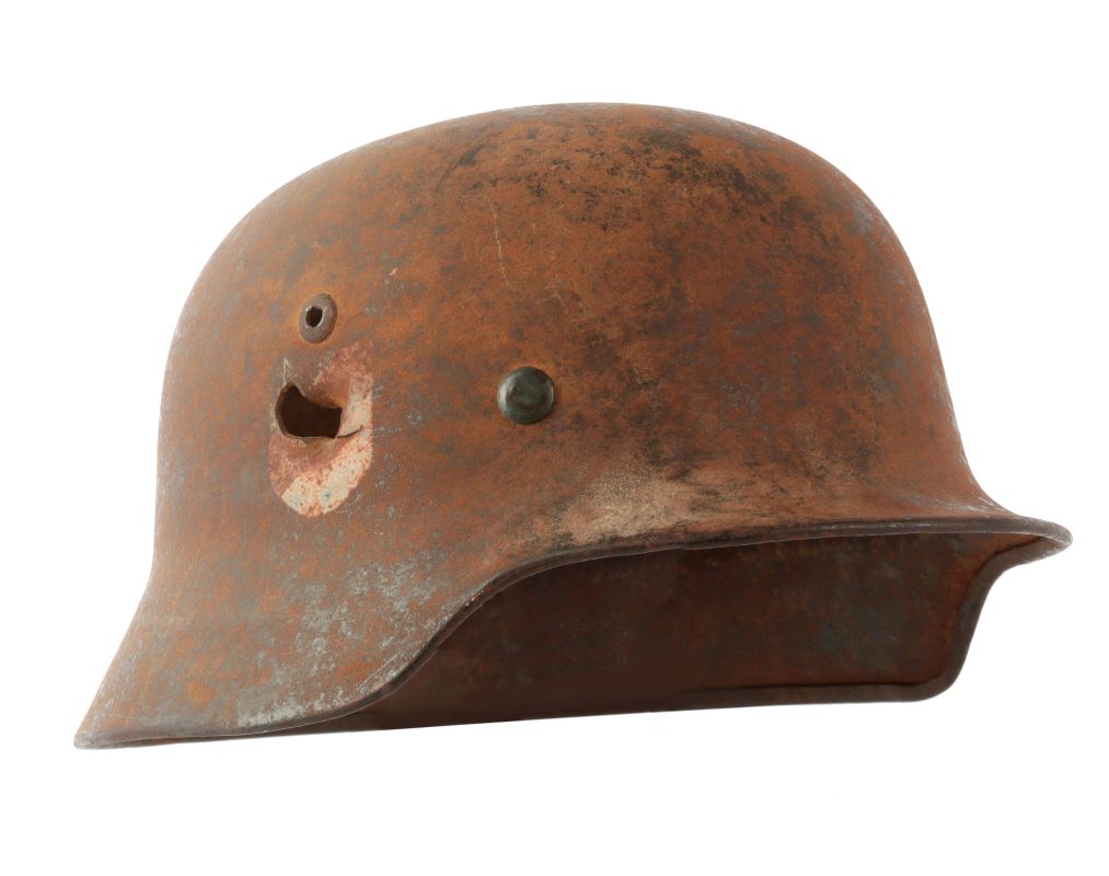 A WWII GERMAN M-35 HELMET W/BULLET PASS THROUGH