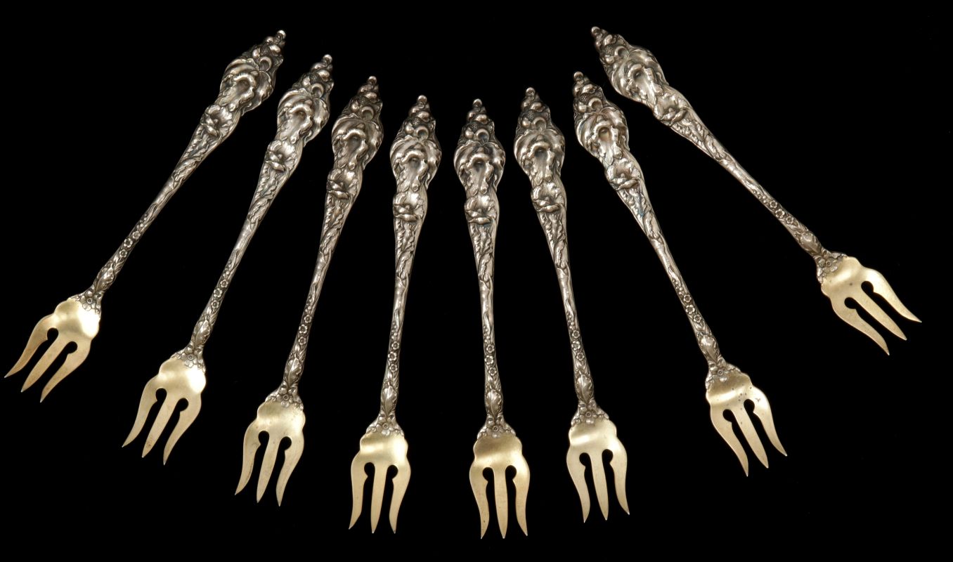 EIGHT 'LES SIX FLEURS' SERVING FORKS 