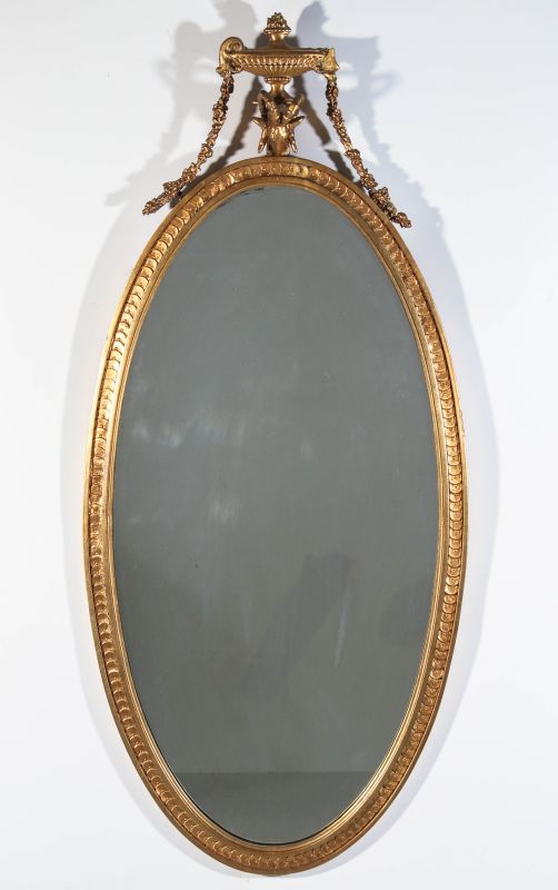 AN EARLY 20TH CENTURY ADAM STYLE MIRROR