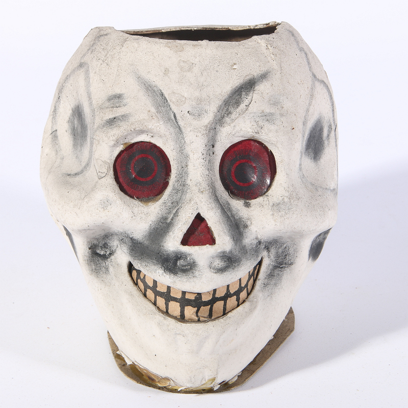 A RARE GERMAN PAPIER MACHE SKULL HALLOWEEN LANTERN