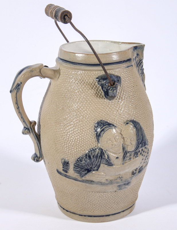 A BLUE AND GRAY STONEWARE JUG ATTR WHITE'S UTICA