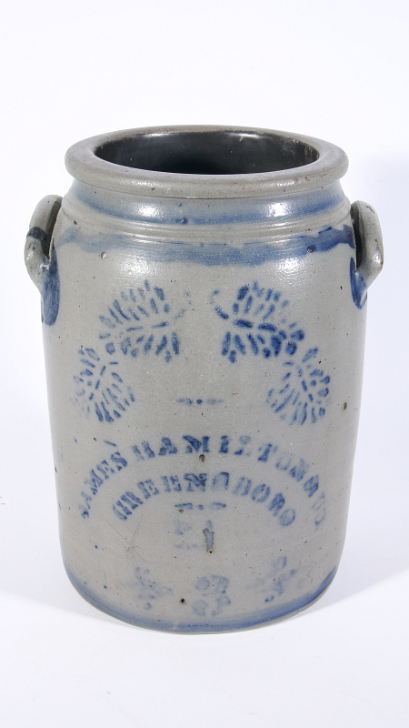 A HAMILTON OF GREENSBORO BLUE DECORATED CROCK 