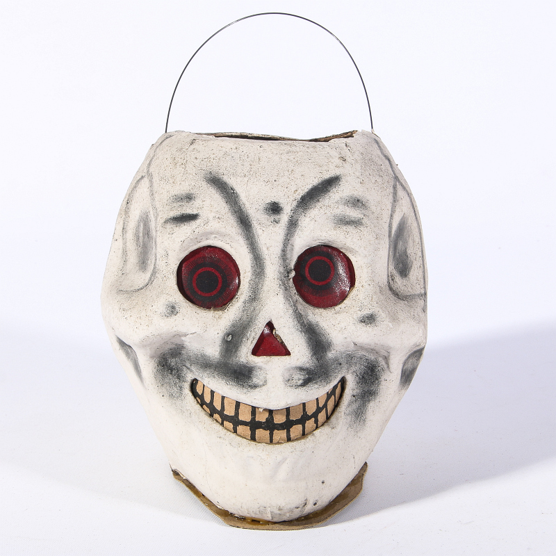 A RARE GERMAN PAPIER MACHE SKULL HALLOWEEN LANTERN