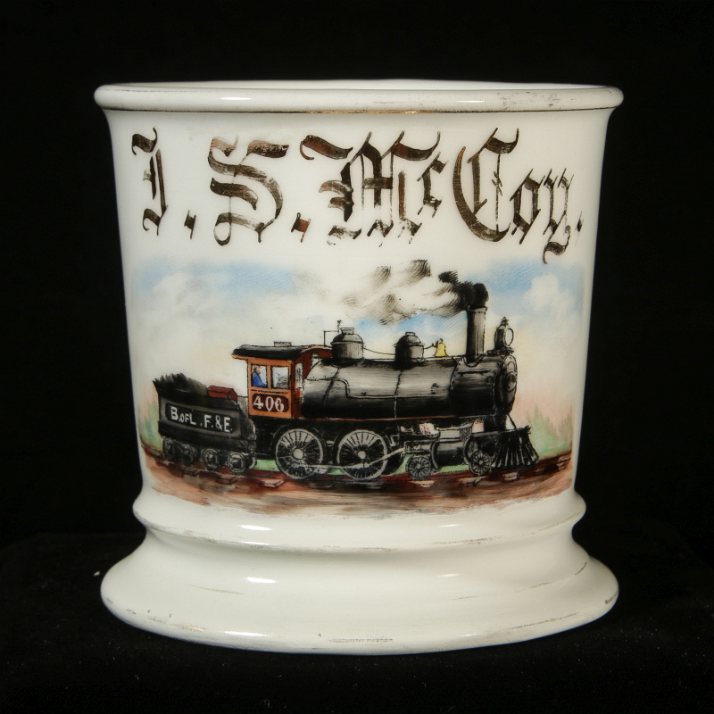 A RAILROAD UNION SHAVING MUG WITH LOCOMOTIVE